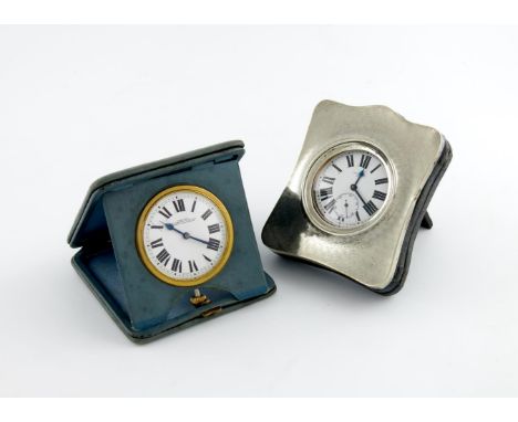 A silver watch case, by H. Matthews, Birmingham 1911, shaped upright rectangular form, engine-turned decoration, easel back, 