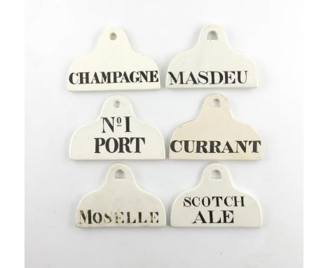 A collection of six 19th century ceramic bin labels, arched rectangular form, titled in black 'No.1 PORT', 'MASDEU', 'CURRANT