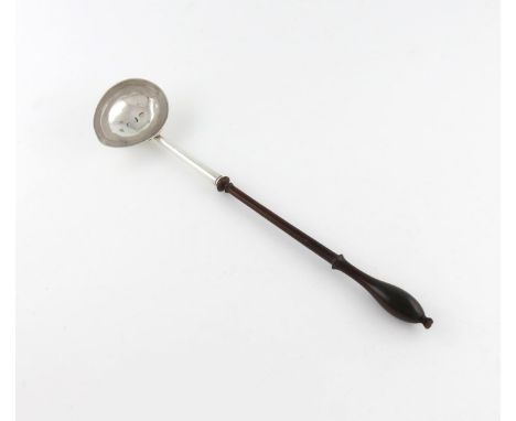 A George II silver punch ladle, by George Baker, London 1736, shaped oval bowl, wooden baluster handle, length 34cm, approx. 
