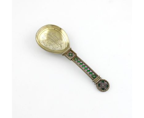 A Norwegian silver-gilt and enamel spoon, by J. Tostrup, Oslo, the fig shaped bowl with a monogram, the handle with purple, g