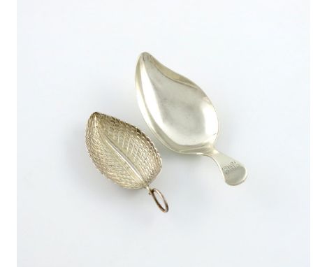 A George III silver caddy spoon, by Matthew Linwood, Birmingham 1814, leaf form, textured decoration, wire-work ring handle, 