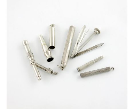 A late-Victorian silver cigar piercer, by S. Mordan and Co Ltd, Chester 1900, push-action form, with a hinged guard, plus two