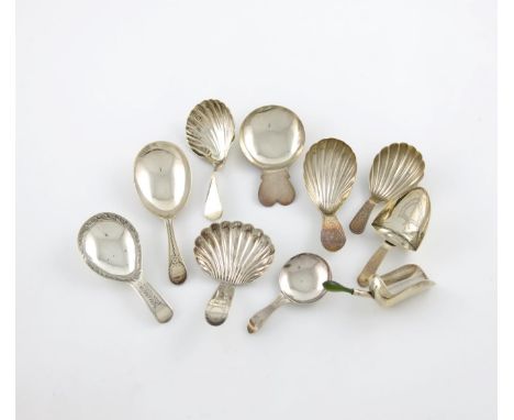 λ A collection of ten antique silver caddy spoons, various designs, comprising: one of shovel form, by Cocks and Bettridge, B