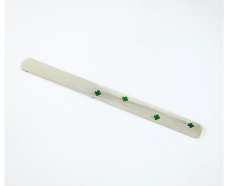 A Victorian silver and enamel paper knife, by William Hornby, London 1900, rounded rectangular form, with four green enamel s