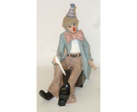 LEONARDO COLLECTION PORCELAIN FIGURE OF A SEATED CLOWN, WITH PLAYING CARDS, IN ORIGINAL BOX WITH CERTIFICATES OF AUTHENTICATI