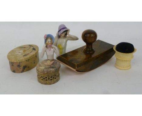 TWO 1920's CHINA PIN CUSHION HALF FIGURES, VICTORIAN CARVED BONE PIN CUSHION, 'BETHLEMHEM' OLIVE WOOD SOUVENIR ROCKER BLOTTER