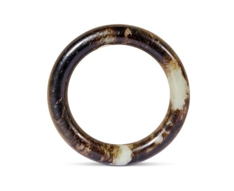 A CHINESE GREEN-GREY AND BLACK JADE BANGLE  QING DYNASTY (1644-1911)  With Reginald Howard Reed Palmer (R.H.R.P) label number