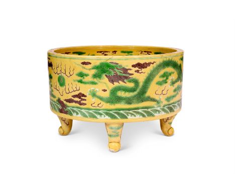 A LARGE CHINESE 'DRAGON' JARDINIERE  QING DYNASTY, 19TH CENTURY  The exterior enamelled in green and aubergine with five-claw