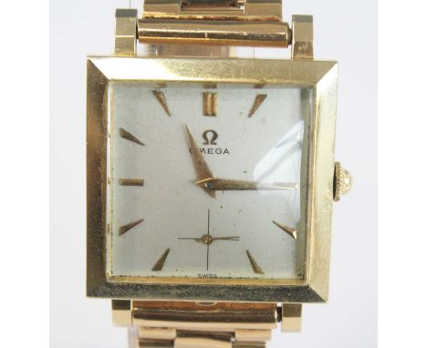 A gent's vintage Omega 9ct gold cased wristwatch, having a signed square silvered dial with baton markers, subsidiary seconds