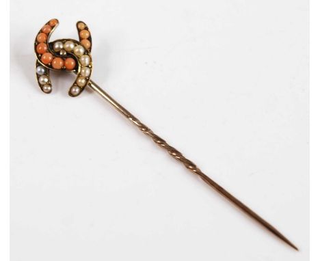 A yellow metal, pearl and coral entwined double horseshoe stick pin, comprising ten 2 to 2.9mm round coral cabochons and ten 