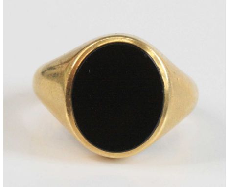 A gent's 18ct gold and black onyx signet ring, onyx measures 14 x 11mm, 12.6g, size Q