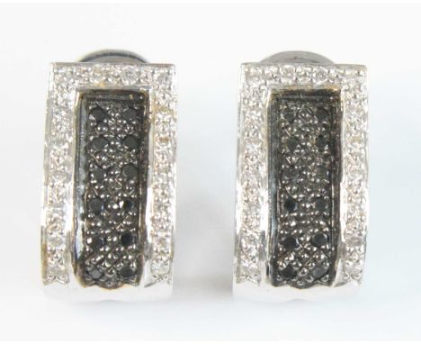 A pair of white metal diamond multi-stone hinged half-hoop earrings, with post and omega fittings, each comprising a centre p