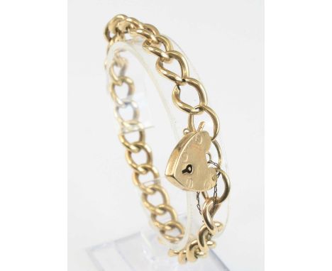 A 9ct gold curblink bracelet, having heart shaped padlock clasp and safety chain, 15.9g, sponsor C&amp;F, 19cmlight surface w