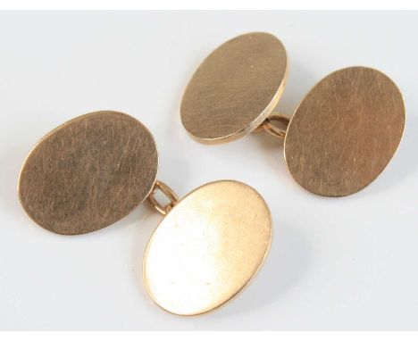 A pair of gent's 9ct gold oval cufflinks, undecorated, 11.3g, sponsor M&amp;M, 18 x 13mm