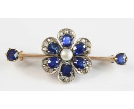 A yellow and white metal, sapphire and diamond bar brooch, featuring a flower cluster with a central 4.1mm button pearl, with