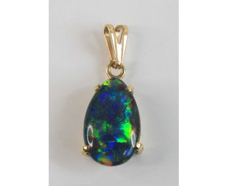 A 9ct gold opal pendant, comprising pear shaped opal triplet measuring 12.9 x 8.2mm, on pendant bale, 1.1g