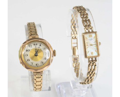 A lady's Rotary 9ct gold cased dress watch having a signed mother of pearl tank dial, quartz movement, and on 9ct gold gateli