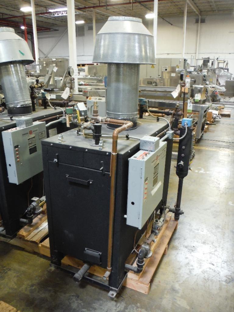 2002 Parker 9.5 hp steam boiler, Model 1039.5, 398,000 btu/hr. natural gas, 100 psi, 345 lbs./hr