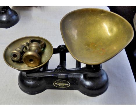 The traditional scales, with imperial weights, cast iron, maker unknown