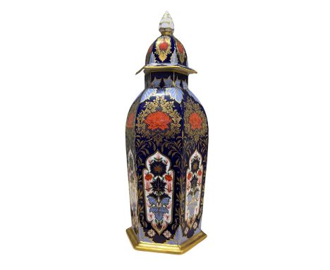 A large Derby Ceramic Art Studios porcelain jar and cover of hexagonal form with moulded pinecone finial, 'Hamilton Imari' pa