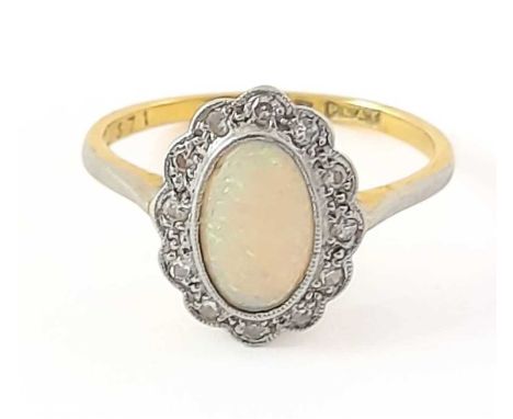 An early 20th century 18ct gold opal and diamond cluster ring