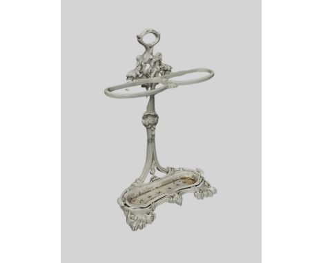 A reproduction Victorian style white painted cast iron stick stand, the foliate scrolled back issuing two holders, drip pan b