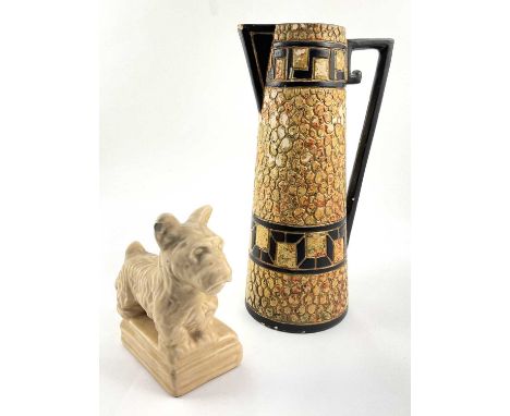 An Art Deco ceramic pebble mosaic patterned jug, approx 28cm high, with a ceramic figurine of a Price Brothers Scottie dog bo