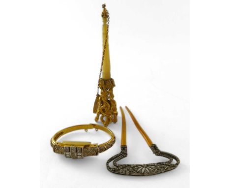 Favre-Leuba, a gold plated bangle bracelet watch, with sprung bracelet arms, an Art Nouveau hair comb and a gilt metal and ca