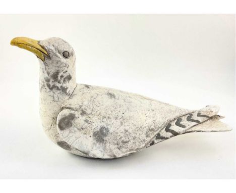 Sylvia Owen, (British, contemporary), a raku-fired ceramic seagull sculpture, marks to base, 18cm high, 12cm wide, 32cm long 