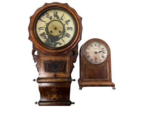 A late 19th century marquetry inlaid drop dial wall clock, likely American, the 30cm diameter Roman numeric dial in a cushion