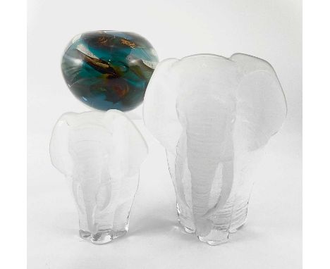 Two Mats Jonasson elephant leaded glass paper weights, tallest measuring 21cm, with a small Medina "tiger pattern" globe vase