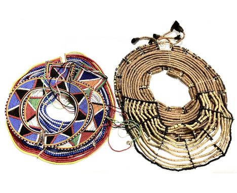 Mid-late 20th century African strung bead necklaces of porcupine quills, coloured beads, shells, leather and string made and 