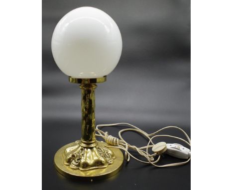 Brass lamp with white glass shade