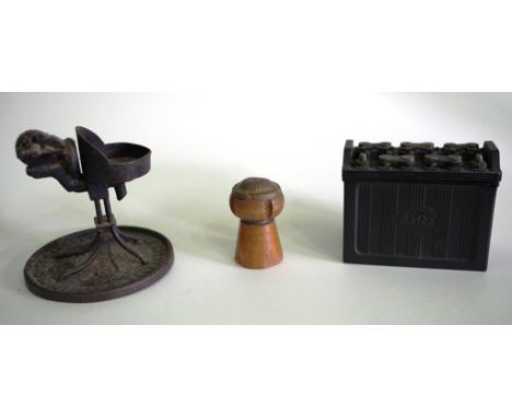 The vintage advertising items including battery vesta / blacksmith stand and a boxwood champagne cork lighter