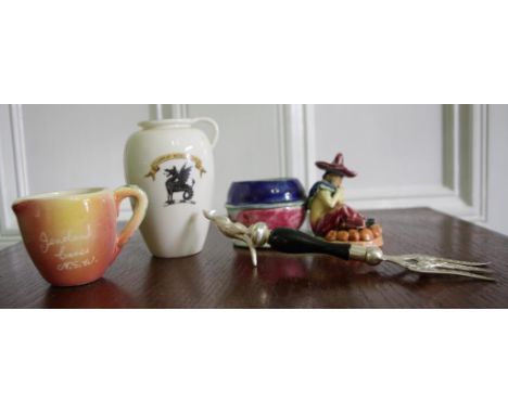 Four various Australian souvenirs including Goss for Newington College, Kangaroo bread fork, Jenolan caves jug, Mexican from 
