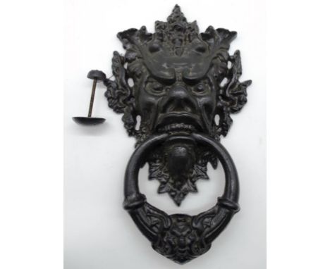 Large cast iron Grotesque door knocker