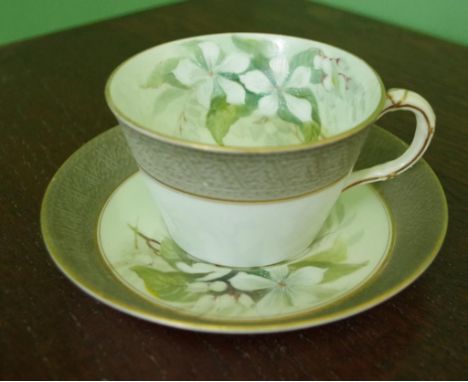 Royal Worcester "Australian" cup &amp; saucer sold by Flavelle Brothers, Sydney.  Crack to saucer, and small hairline to edge