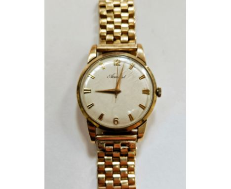 A 1950's Accurist gentleman's manual wind wristwatch, 9ct gold case and strap, with case and 1959 dated guarantee  (R)  £300 