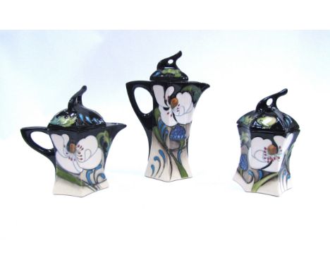 A Moorcroft Au Lait three piece coffee set, coffee pot, lidded cream jug and lidded sucrier, 17cm tall coffee pot 