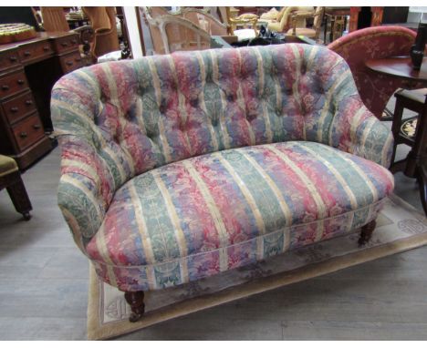Circa 1900 sofa on ring turned tapering fore legs and castors, 77cm x 125cm x 86cm 