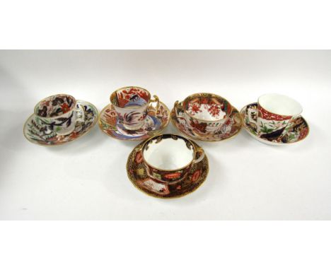 Five 19th Century imari cups and saucers to include Spode and Crown Derby 