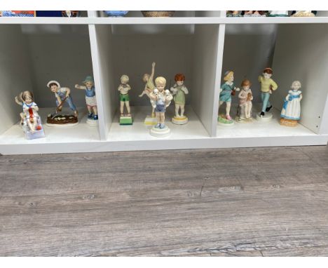 Twelve Royal Worcester Week Day Child figures 