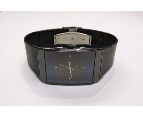A Rado jubile Diastar wristwatch, four diamonds to face  (R)  £150  SPEC 