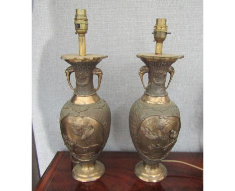 A pair of Japanese cast metal table lamp bases with bird on branch decoration (no shades) 
