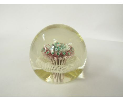 A Vintage glass paperweight, probably Murano with Millefiori mushroom surrounded by a latticino ring. Unmarked. 7.5cm diamete