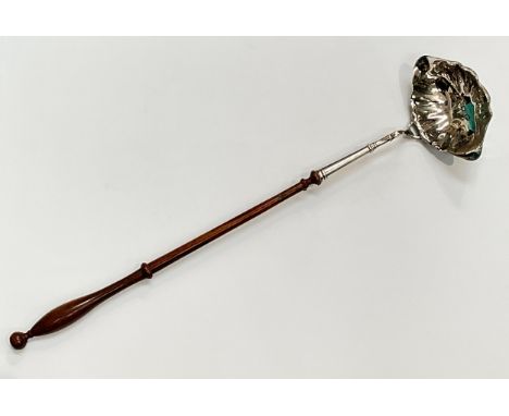 A silver toddy ladle with turned wood handle, London, 39.5cm long 