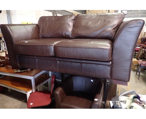 Brown leather two seater sofa and a brown leather tub chair with pouffe. Not available for in-house P&amp;P, contact Paul O'H