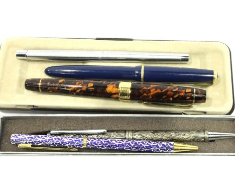 Five pens to include a cased Paper Mate fountain pen and a Parker Victory example. P&amp;P Group 1 (£14+VAT for the first lot
