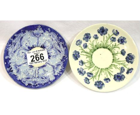 Two Moorcroft Macintyre Florian Ware saucers, each D: 12 cm, one signed, both crazed, hairline crack to one. P&amp;P Group 2 