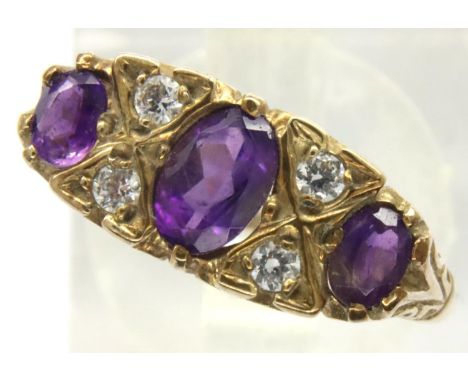 9ct gold amethyst and white stone set ring, size M/N, 2.4g. P&amp;P Group 1 (£14+VAT for the first lot and £1+VAT for subsequ